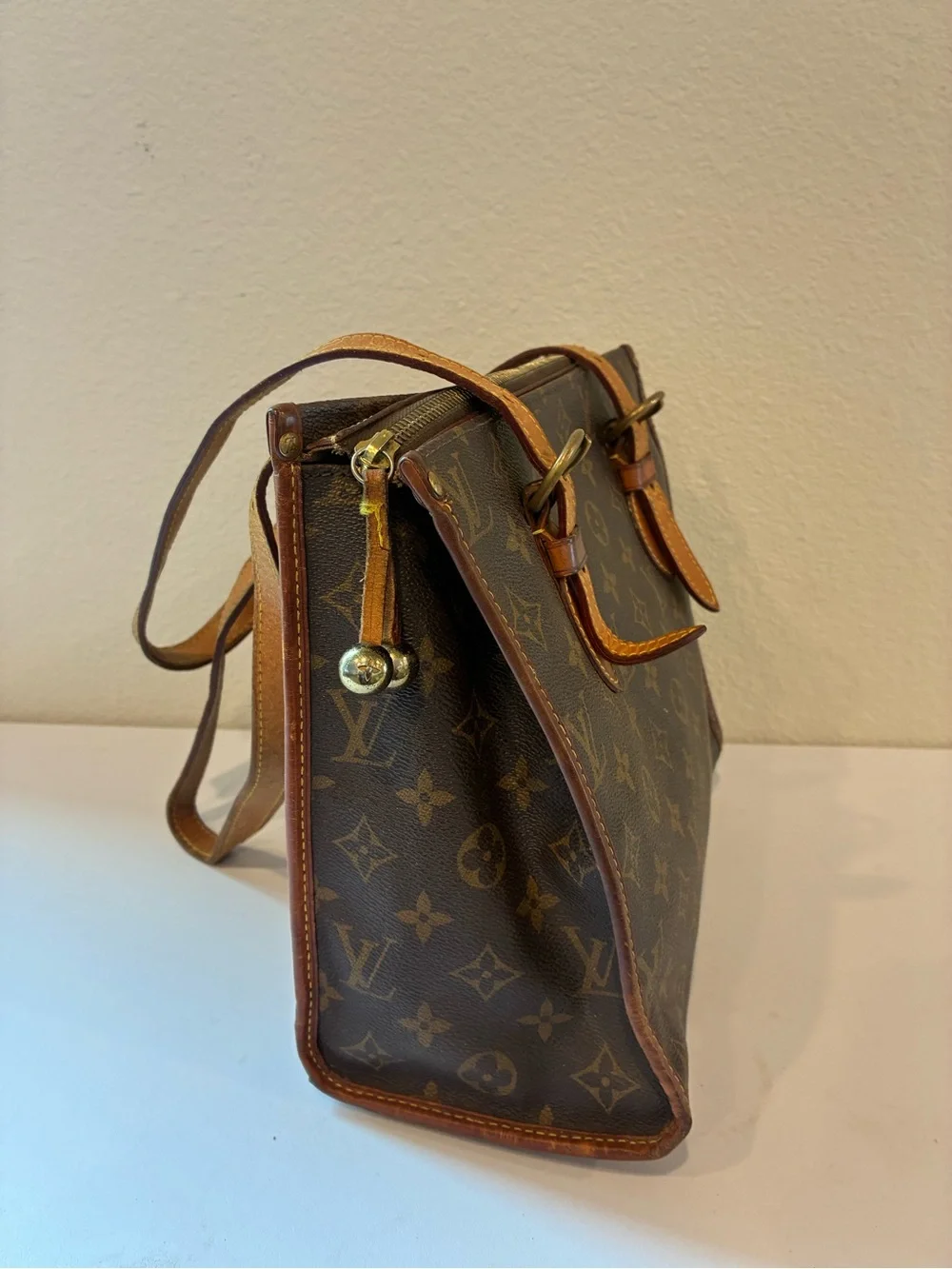 LOUIS VUITTON POPINCOURT HANDBAG.